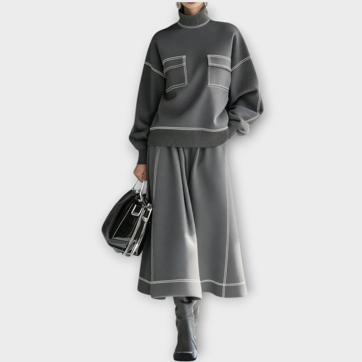 Woman wearing charcoal gray mock neck two-piece set