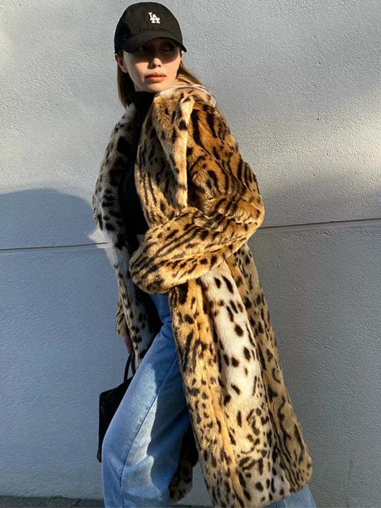 Woman wearing long leopard print faux fur coat