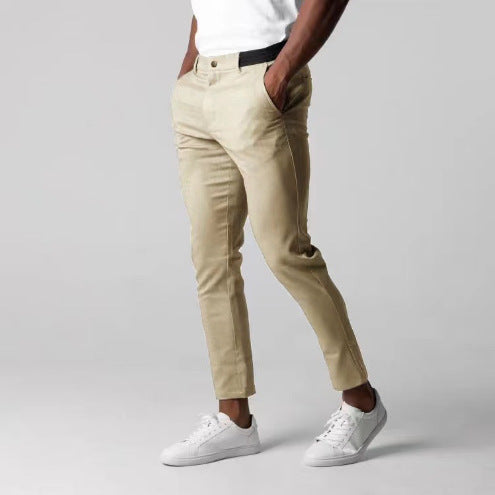 Man wearing slim straight business dress pants