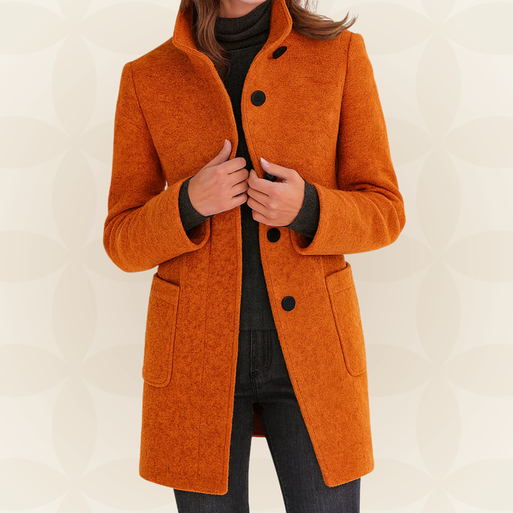 Woman wearing a classic coat with high collar