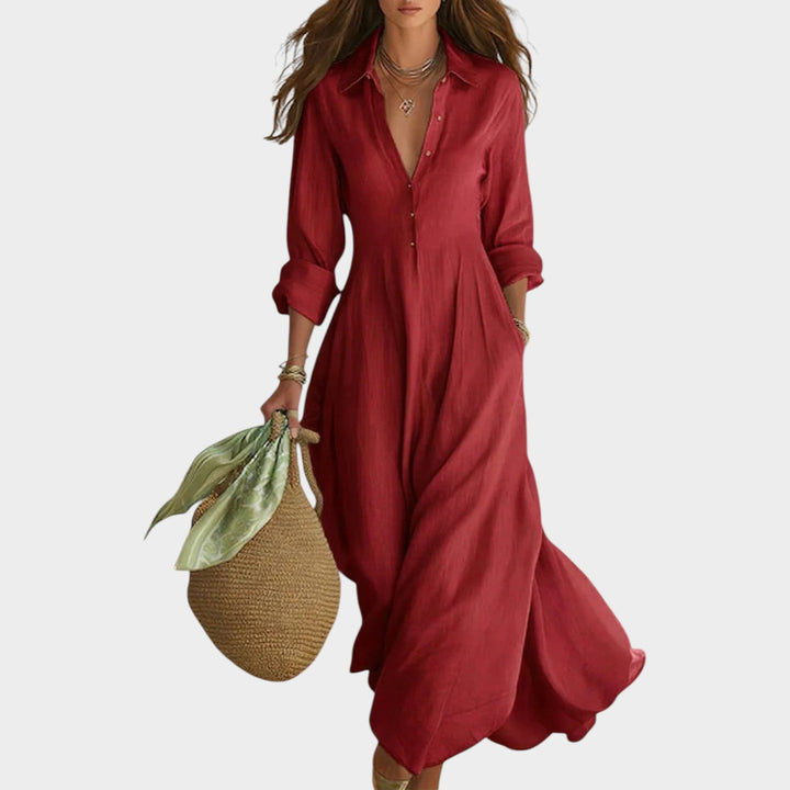 Woman wearing green button front maxi dress with long sleeves