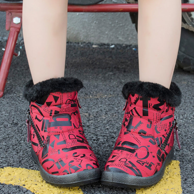 Woman wearing pink letter print plush-lined snow boots