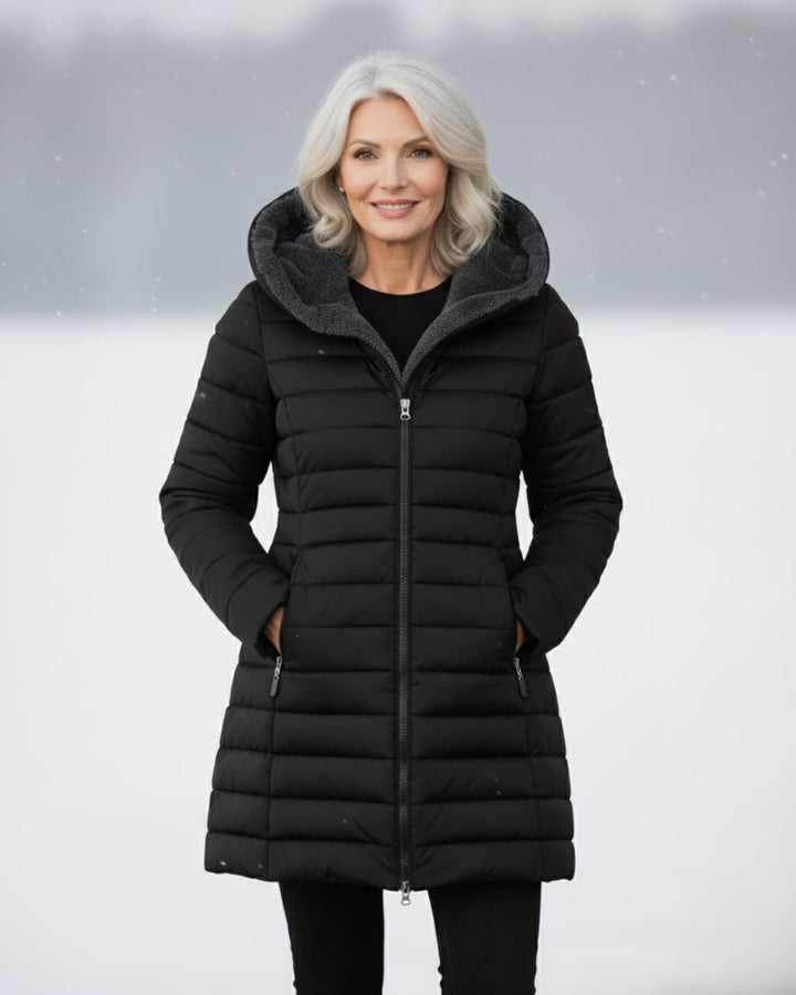 Woman wearing fleece-lined A-line puffer coat outdoors