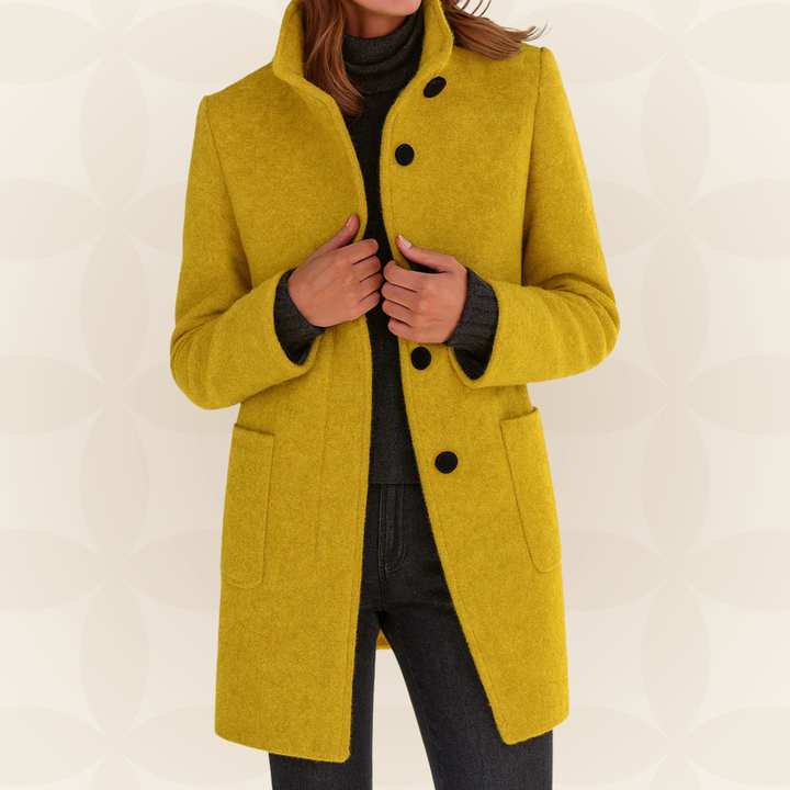 Woman wearing a classic coat with high collar