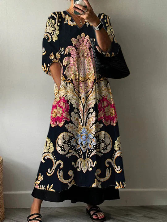 Woman wearing white and black geometric summer maxi dress