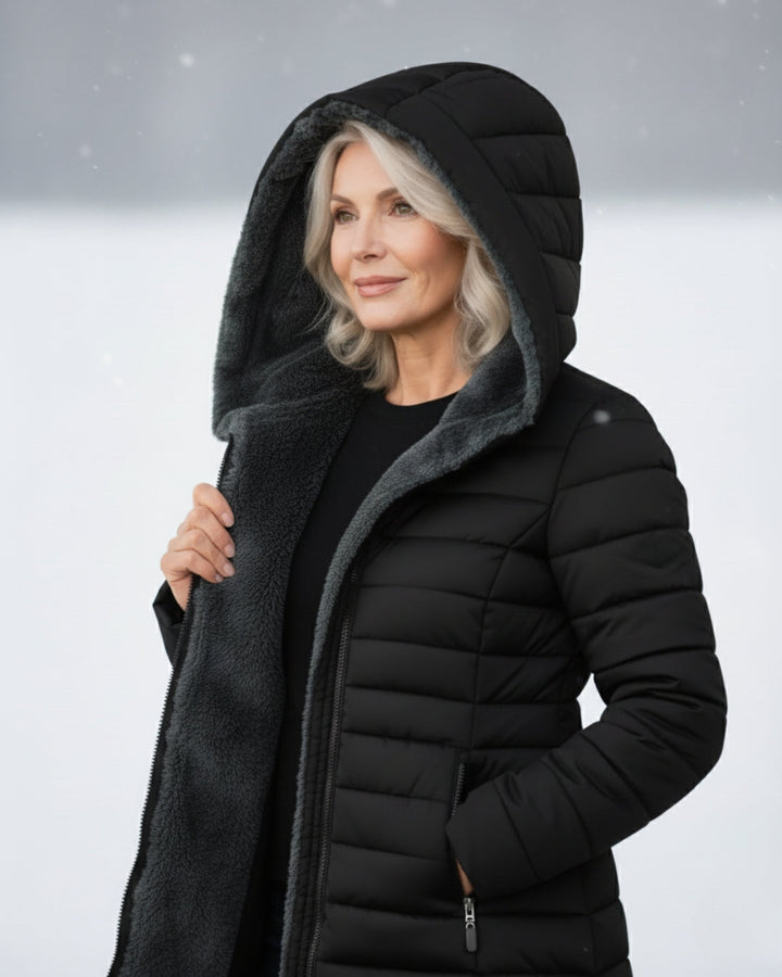 Woman wearing fleece-lined A-line puffer coat outdoors