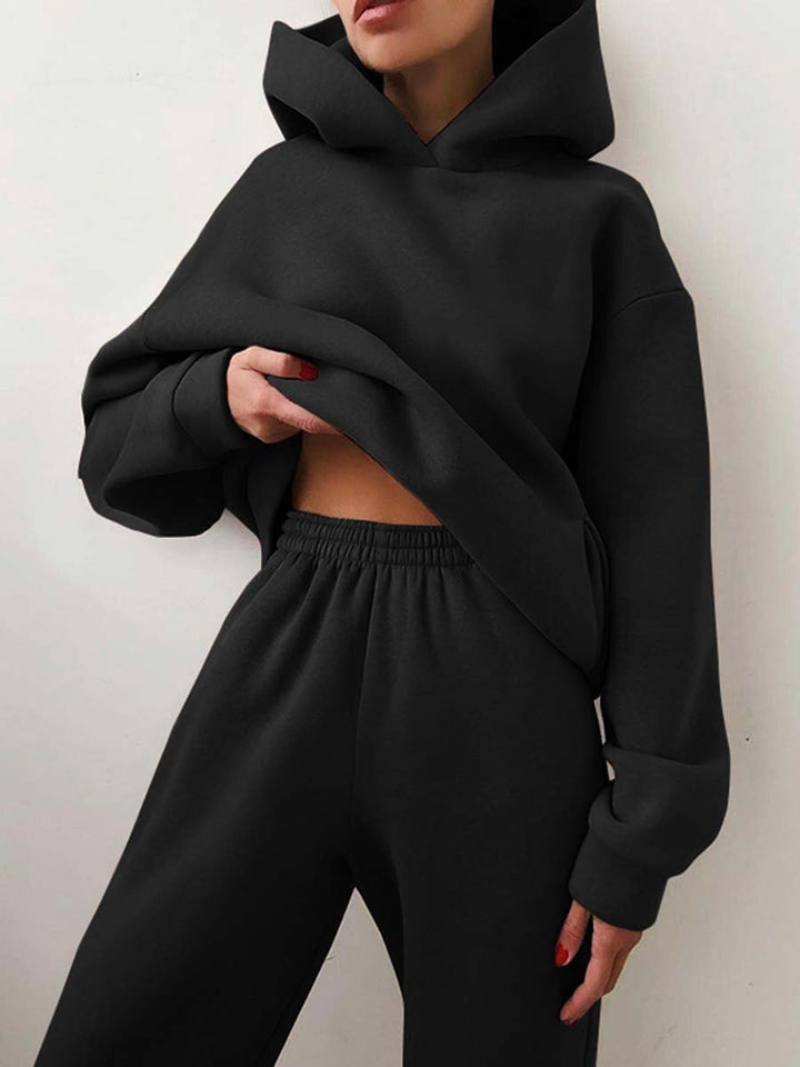 Woman wearing matching hooded knit tracksuit set – Detail view 17