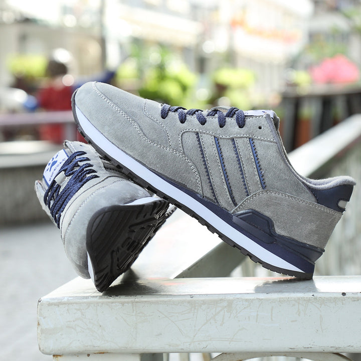 Men's gray low-top casual sneakers with rubber sole