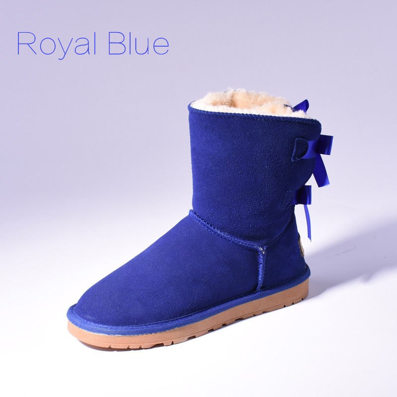 Women's mid-calf snow boots with fur lining and bow detail