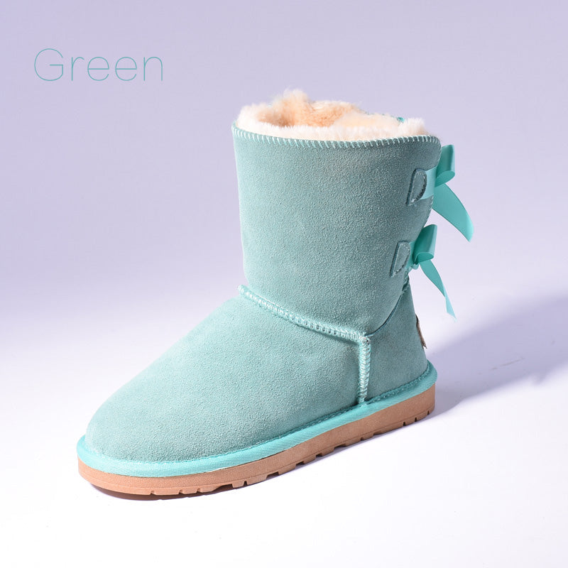 Women's mid-calf snow boots with fur lining and bow detail