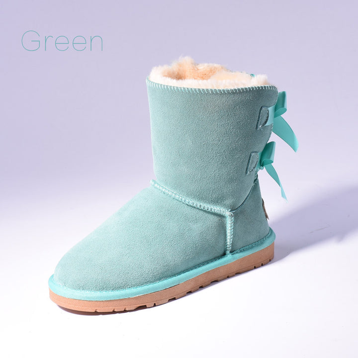 Women's mid-calf snow boots with fur lining and bow detail