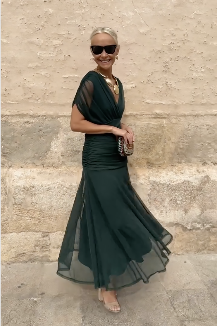 Woman in floral print V-neck maxi dress