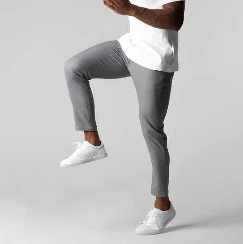 Man wearing slim straight business dress pants