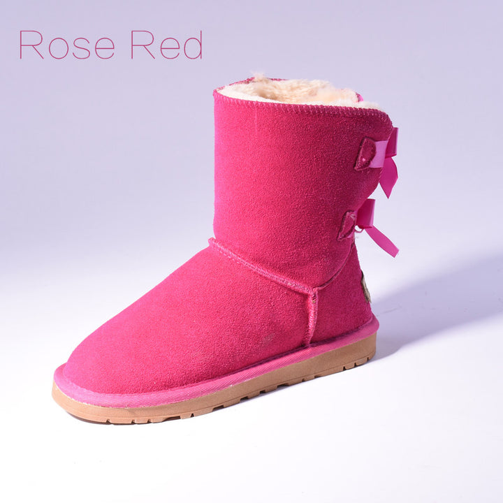 Women's mid-calf snow boots with fur lining and bow detail