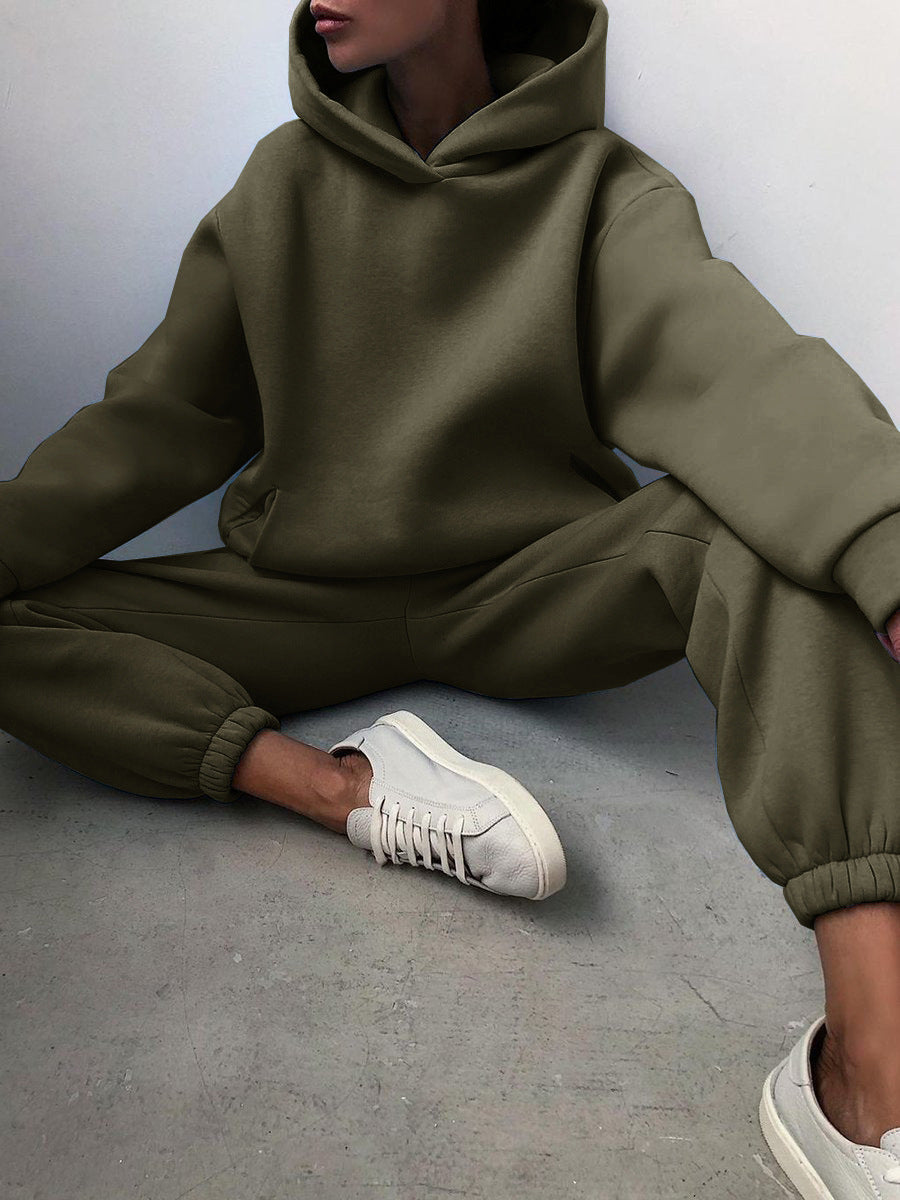 Woman wearing matching hooded knit tracksuit set – army green