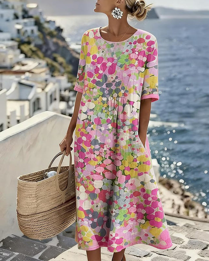 Woman wearing abstract floral print midi dress outdoors