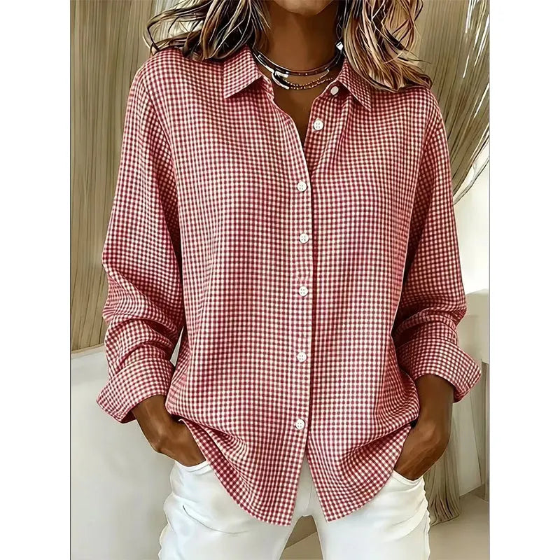 Woman wearing gingham button-up blouse with long sleeves