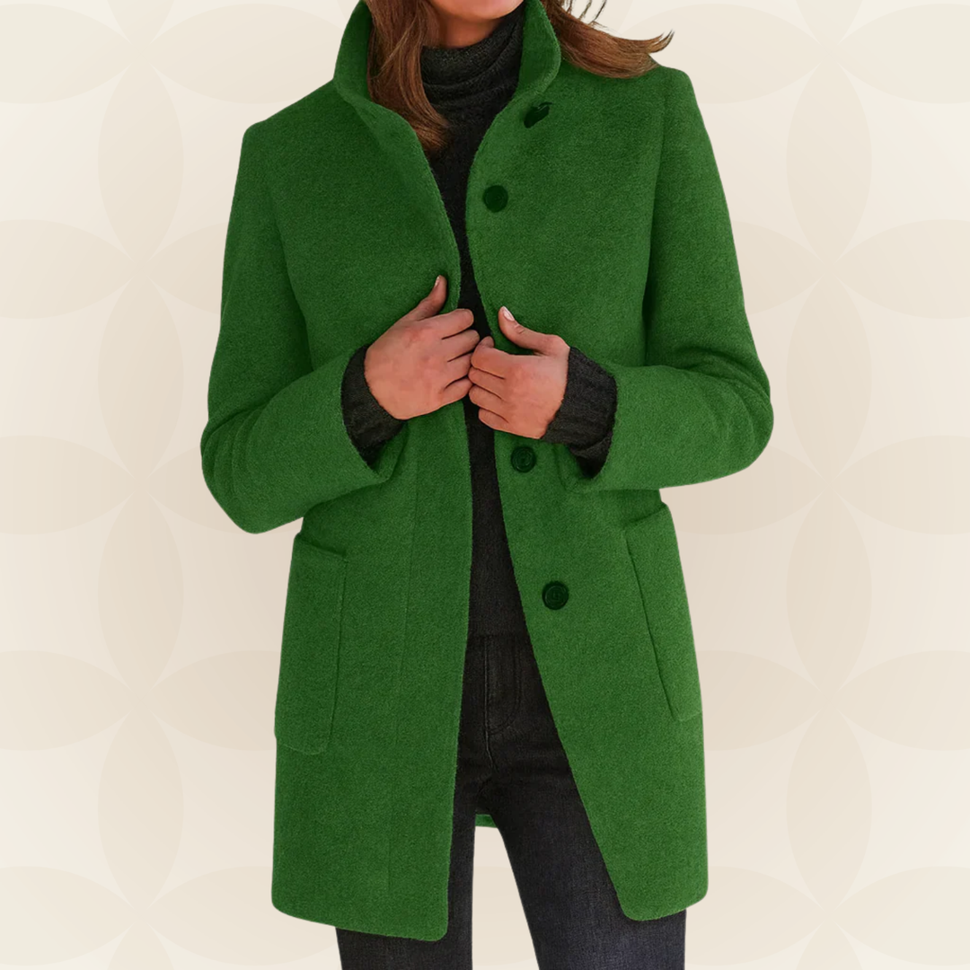 Woman wearing a classic coat with high collar