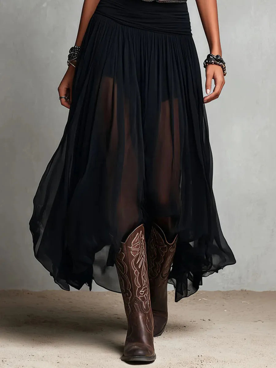 Woman wearing double layer maxi dress with sheer panels