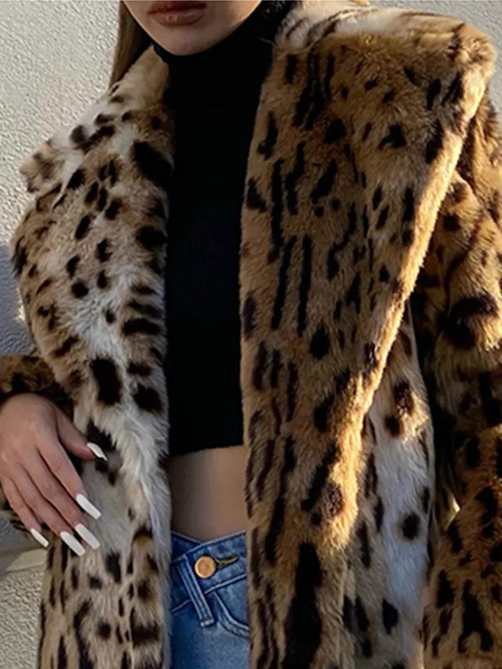 Woman wearing long leopard print faux fur coat