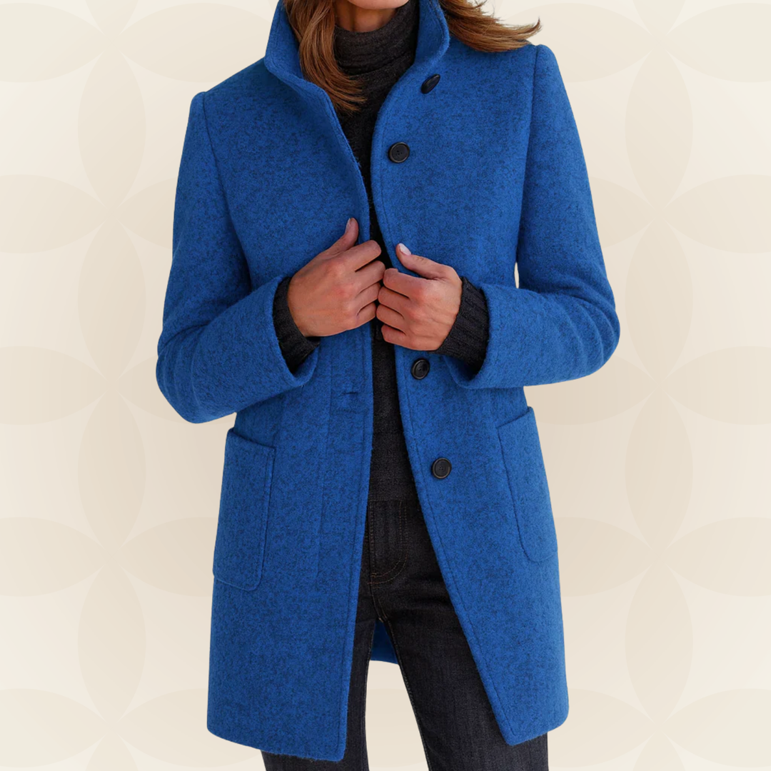 Woman wearing a classic coat with high collar
