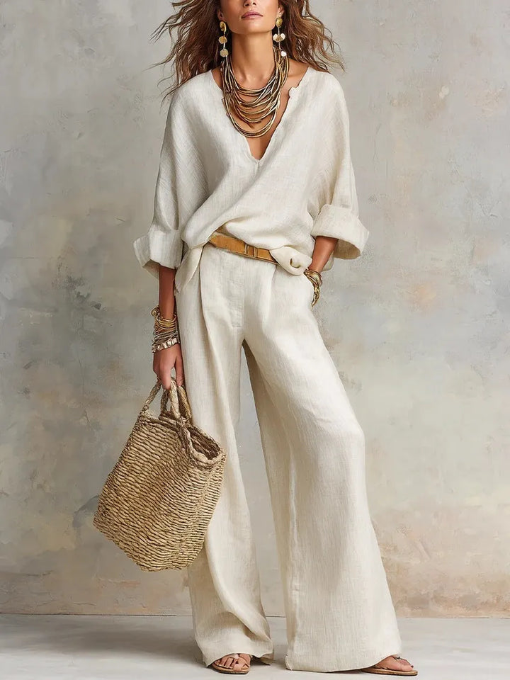 Woman wearing V-neck two piece set with wide leg pants