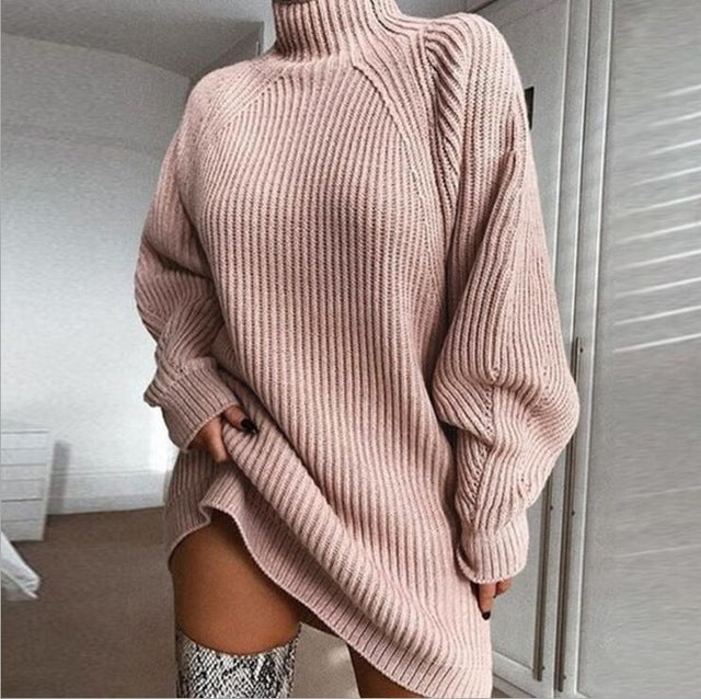 Woman wearing long sleeve turtleneck knit sweater dress