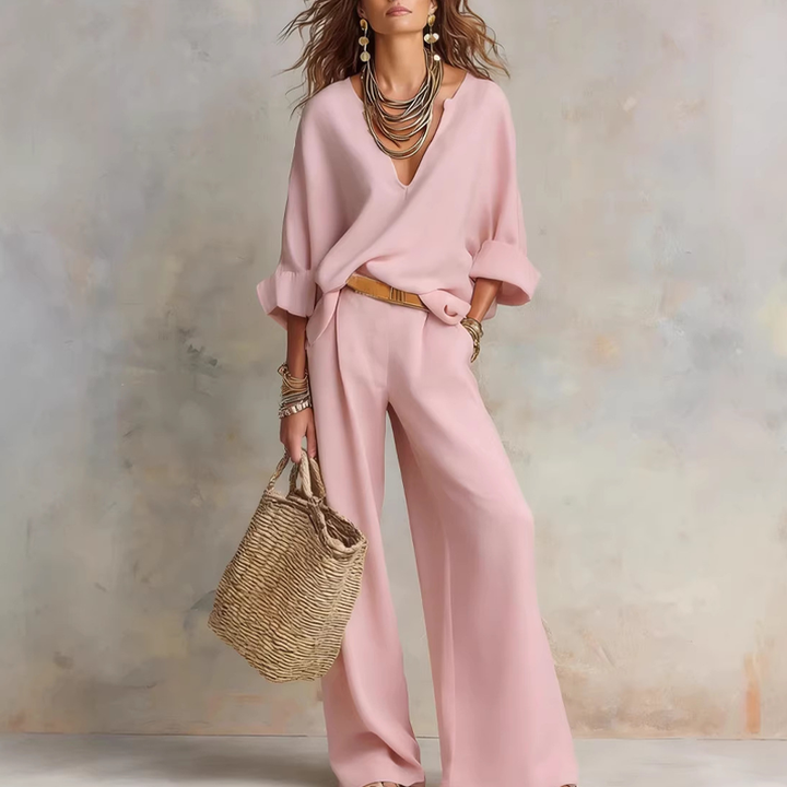 Woman wearing V-neck two piece set with wide leg pants