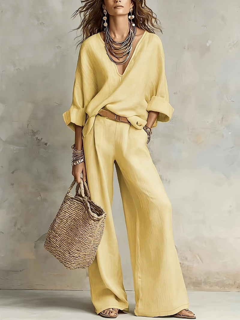 Woman wearing V-neck two piece set with wide leg pants