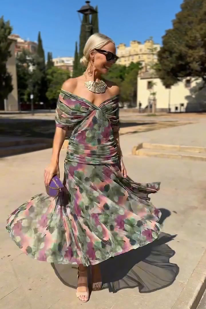 Woman in floral print V-neck maxi dress