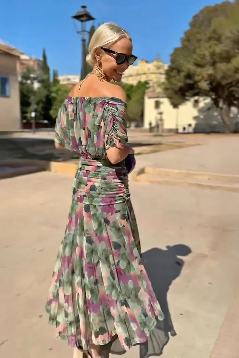 Woman in floral print V-neck maxi dress
