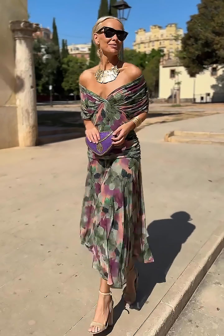 Woman in floral print V-neck maxi dress