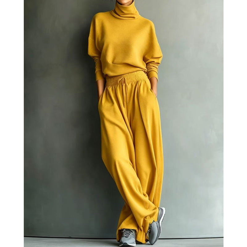 Woman wearing turtleneck two-piece set with wide-leg pants
