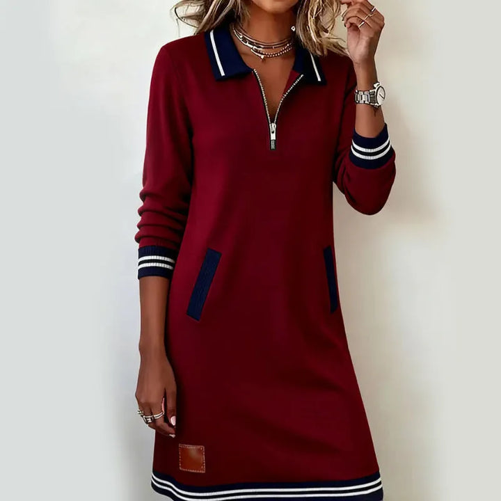 Woman wearing polo mini dress with quarter-zip collar