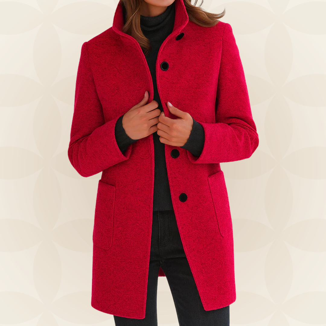Woman wearing a classic coat with high collar