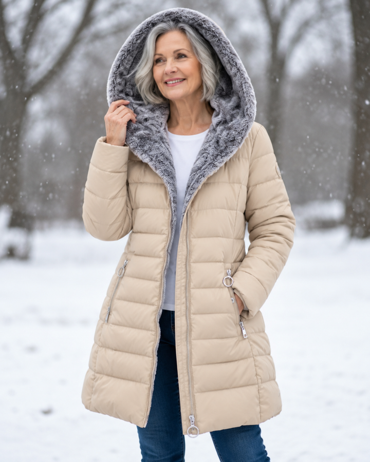 Woman wearing padded winter coat with hood