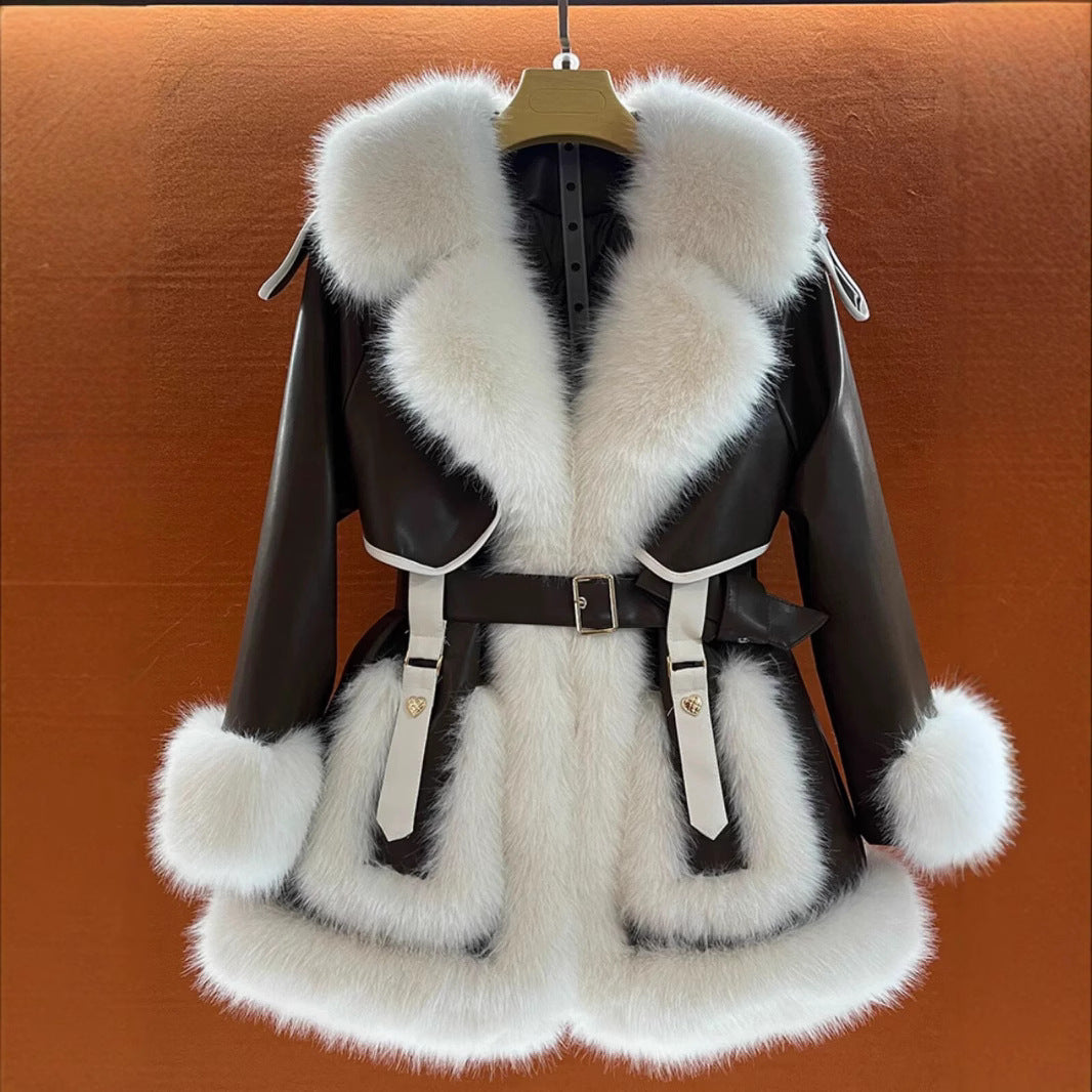 Woman wearing beige faux fur coat with fur collar