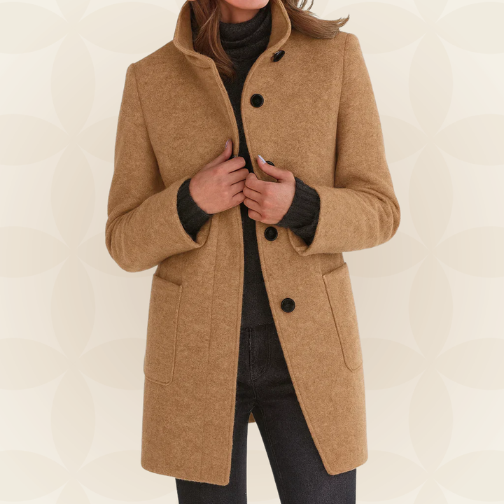 Woman wearing a classic coat with high collar