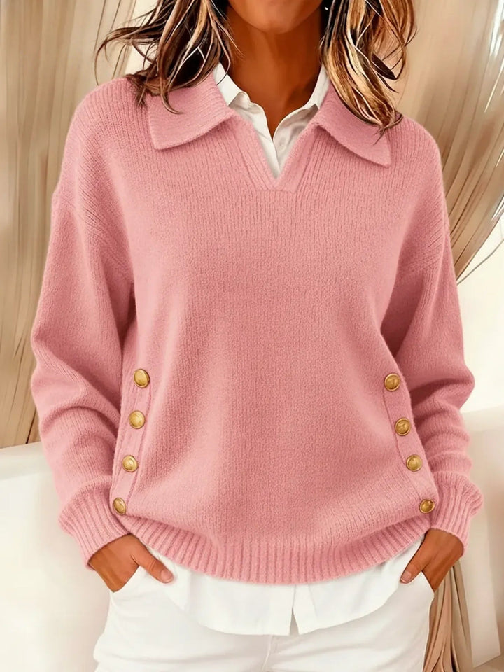Woman wearing V-neck collared sweater with gold buttons