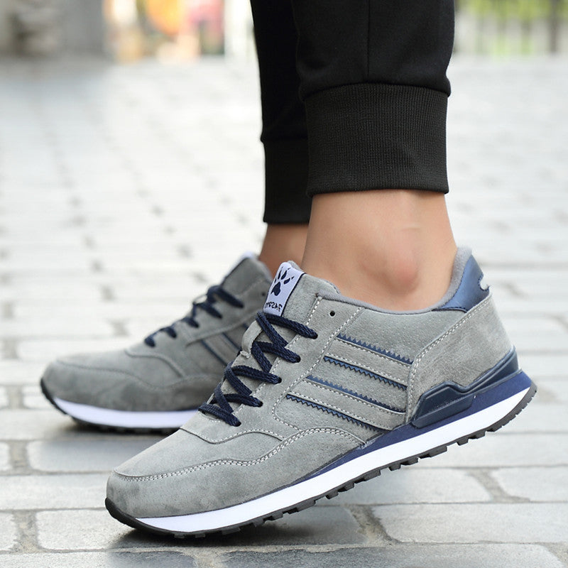 Men's gray low-top casual sneakers with rubber sole
