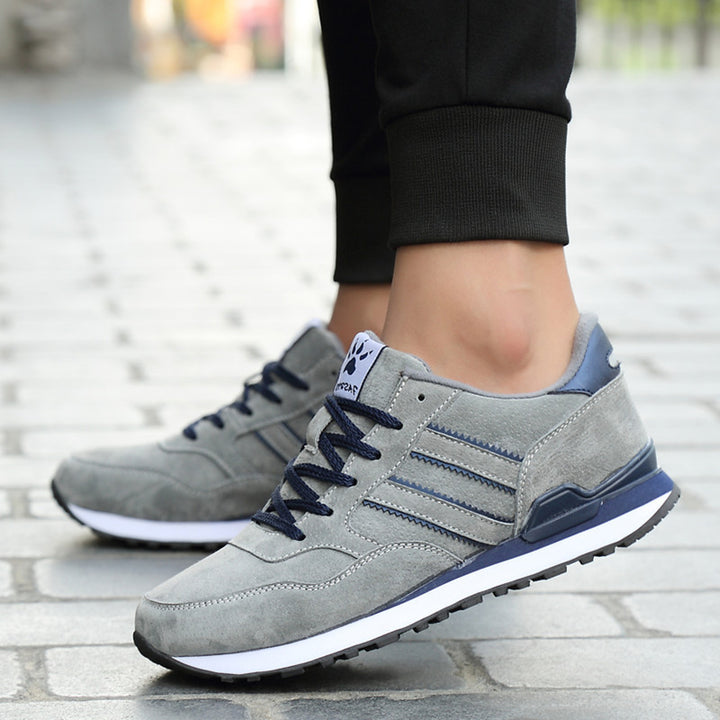 Men's gray low-top casual sneakers with rubber sole