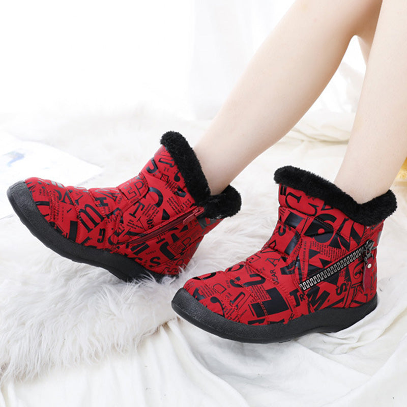Woman wearing pink letter print plush-lined snow boots
