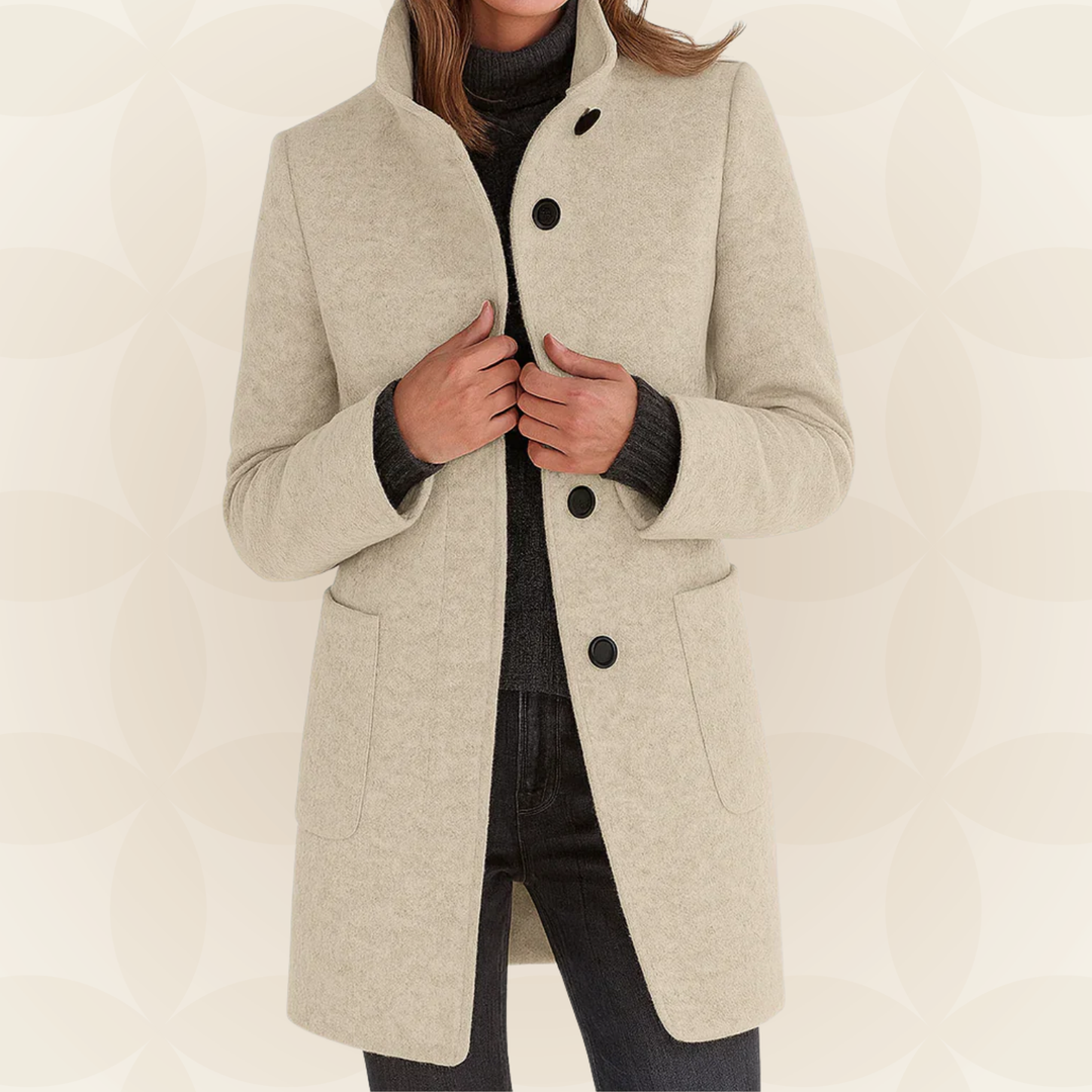 Woman wearing a classic coat with high collar
