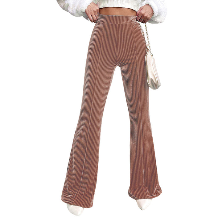 Woman wearing brown high waist corduroy wide leg pants