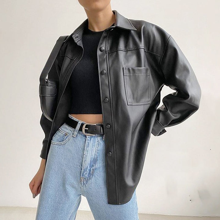 Women's black motorcycle jacket with loose biker-inspired fit