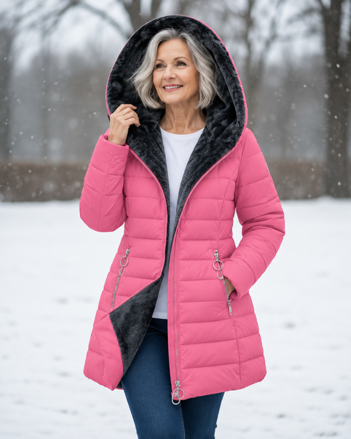 Woman wearing padded winter coat with hood