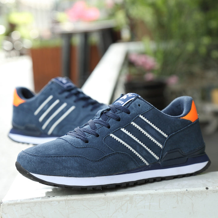 Men's gray low-top casual sneakers with rubber sole