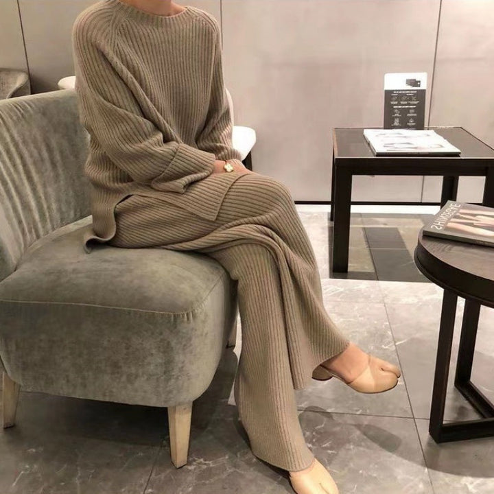 Woman wearing knit sweater top and wide-leg pants suit
