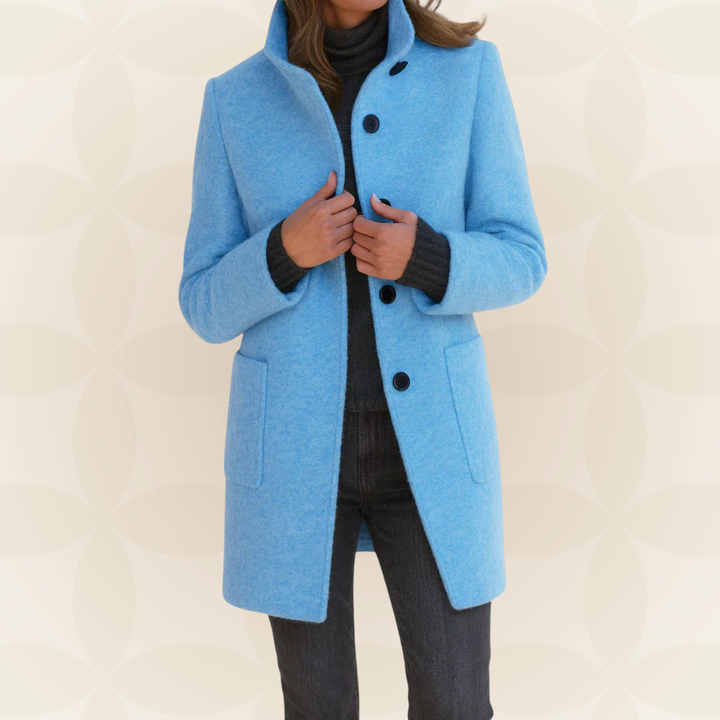 Woman wearing a classic coat with high collar