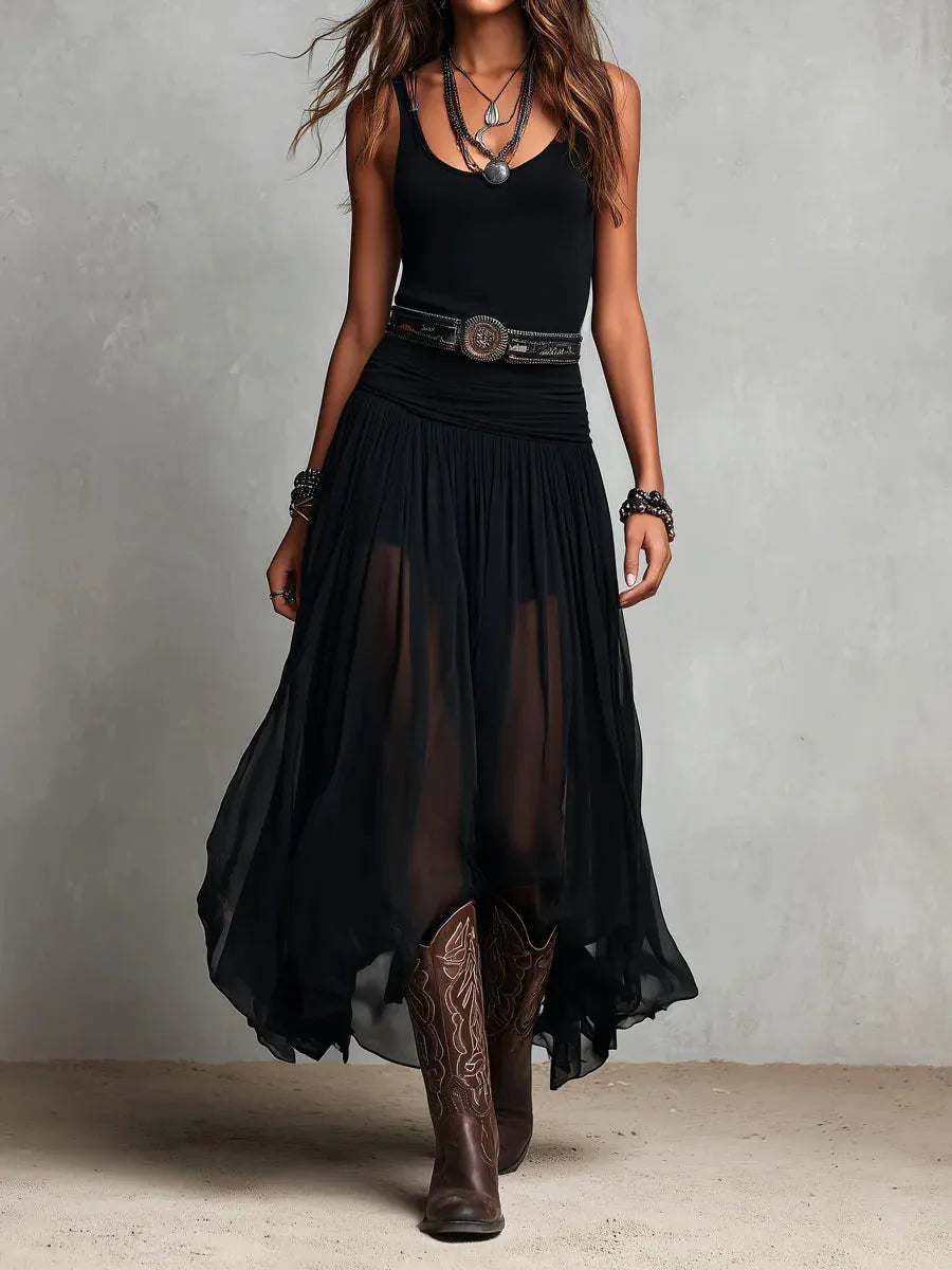 Woman wearing double layer maxi dress with sheer panels